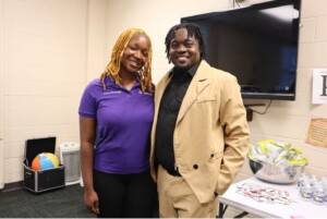 Erica Minta, a master’s-level social work student from Clark Atlanta University, and Tedrick Baines, Lead Coordinator for Enrichly. 