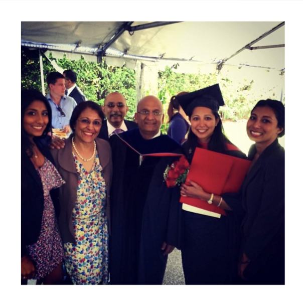Jannine Versi on her college graduation with her family.