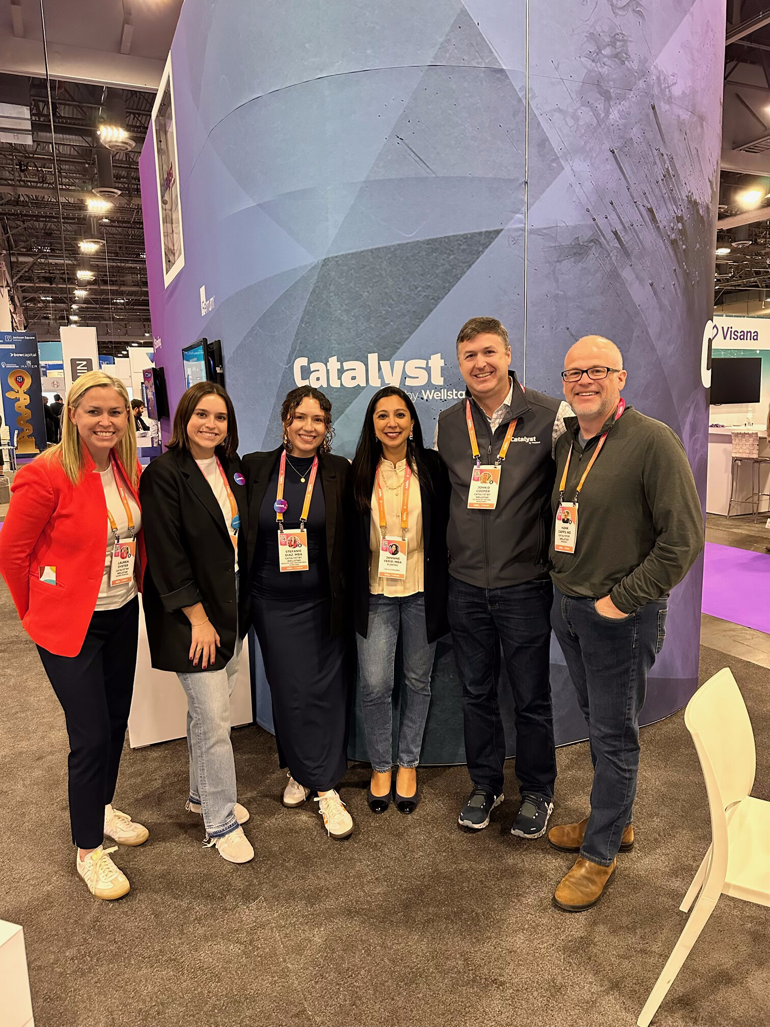 Jannine with the Catalyst team at a conference.